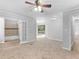 Spacious bedroom with an attached bathroom and access to the deck at 4720 Hull Rd, Conyers, GA 30094