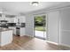 Spacious kitchen with stainless steel appliances, a gray countertop, and a sliding glass door at 4720 Hull Rd, Conyers, GA 30094
