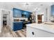 Modern kitchen with shaker cabinets in a navy blue finish and white countertops at 3229 Dunlin Lake Rd, Lawrenceville, GA 30044