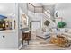 Spacious living room with a staircase, comfortable seating, and a view of the kitchen at 3229 Dunlin Lake Rd, Lawrenceville, GA 30044