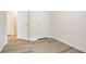 Neutral room showcasing modern floors, door openings, and ample natural light at 4130 Stonecypher Rd, Suwanee, GA 30024