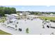 A modern park featuring a pavilion, a splash pad, seating, landscaping, and walking trails at 4130 Stonecypher Rd, Suwanee, GA 30024