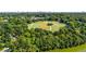 Expansive aerial view of a park with athletic fields surrounded by dense trees, offering recreational opportunities at 1055 Piedmont Ne Ave # 401, Atlanta, GA 30309