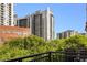 Balcony view of nearby building with trees at 1055 Piedmont Ne Ave # 401, Atlanta, GA 30309