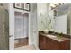 Bathroom featuring granite countertop, modern fixtures, and a glass enclosed shower at 1055 Piedmont Ne Ave # 401, Atlanta, GA 30309