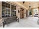 Covered entrance featuring a wooden door and comfortable benches for a relaxing visit at 1055 Piedmont Ne Ave # 401, Atlanta, GA 30309