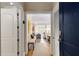 Entryway with a bench and a view into the living room showcases the home's open layout at 1055 Piedmont Ne Ave # 401, Atlanta, GA 30309