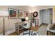 Bright home office area features a desk, artwork, and comfortable seating at 1055 Piedmont Ne Ave # 401, Atlanta, GA 30309