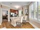 Charming kitchen with stainless steel appliances, breakfast bar, and wood-look flooring at 1055 Piedmont Ne Ave # 401, Atlanta, GA 30309
