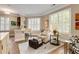 Open floor plan kitchen area featuring an island seating area and lots of natural light at 1055 Piedmont Ne Ave # 401, Atlanta, GA 30309