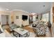 Open-concept living room with hardwood floors, neutral tones, and lots of natural light at 1055 Piedmont Ne Ave # 401, Atlanta, GA 30309