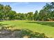 Expansive green park with mature trees and open space, perfect for recreation and relaxation at 1055 Piedmont Ne Ave # 401, Atlanta, GA 30309