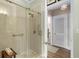 Modern bathroom with a glass-enclosed shower featuring tile walls and modern fixtures at 1055 Piedmont Ne Ave # 401, Atlanta, GA 30309