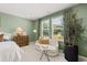 Comfortable bedroom featuring a sitting area, soft textures, and stylish decor at 229 Paisley Way, Locust Grove, GA 30248