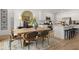 Stylish dining area leading to a modern kitchen, perfect for entertaining at 229 Paisley Way, Locust Grove, GA 30248