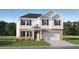 New construction two-story home with brick and white siding and a two-car garage at 229 Paisley Way, Locust Grove, GA 30248