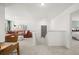Bright hallway with a glimpse of a living area and bedroom at 229 Paisley Way, Locust Grove, GA 30248