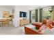Stylish living area with modern furnishings, green curtains, and ample natural light at 229 Paisley Way, Locust Grove, GA 30248