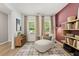 Inviting sitting area with unique furniture, warm colors, and natural light at 229 Paisley Way, Locust Grove, GA 30248