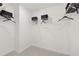 Clean, minimalist walk-in closet with shelving and hanging space at 229 Paisley Way, Locust Grove, GA 30248