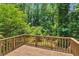 Large wooden deck overlooking the lush backyard at 3357 Huntwood Ct, Decatur, GA 30034