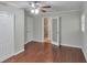 Spacious bedroom with hardwood floors, ceiling fan and ensuite bathroom at 3357 Huntwood Ct, Decatur, GA 30034