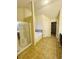 Bathroom featuring a bathtub and separate glass door shower at 3429 Lake End Dr, Loganville, GA 30052