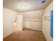 Bedroom features carpet, a window and a closet with shelves at 3429 Lake End Dr, Loganville, GA 30052