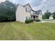 Well-maintained home with a spacious yard and mature trees, offering privacy at 3429 Lake End Dr, Loganville, GA 30052