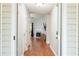 Inviting foyer with wood floors leads into the living room with a fireplace, creating a warm atmosphere at 5279 Leecroft Dr, Buford, GA 30518
