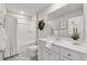 Bright bathroom with shower-tub combo, modern vanity, and neutral color palette at 4090 Sierra Knolls Ct, Cumming, GA 30040