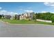 Beautiful home with green lawn and a well-manicured yard in a quiet neighborhood at 4090 Sierra Knolls Ct, Cumming, GA 30040