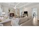 Inviting living room features coffered ceilings, a stone fireplace, and neutral décor at 4090 Sierra Knolls Ct, Cumming, GA 30040
