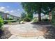 Charming building exterior surrounded by manicured landscaping and lush greenery at 5200 Peachtree Rd # 1104, Atlanta, GA 30341