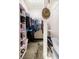 Walk-in closet with organized shelving and plenty of storage at 5200 Peachtree Rd # 1104, Atlanta, GA 30341