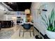 Bright open floor plan features a modern dining area adjacent to a stylish, well-equipped kitchen at 5200 Peachtree Rd # 1104, Atlanta, GA 30341