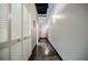 Hallway featuring lots of built-in storage and recessed lighting at 5200 Peachtree Rd # 1104, Atlanta, GA 30341