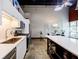 The bright modern kitchen has stainless steel appliances, sleek countertops and opens to the living area at 5200 Peachtree Rd # 1104, Atlanta, GA 30341