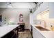 The kitchen has a large island with barstools and stainless steel appliances and plenty of workspace at 5200 Peachtree Rd # 1104, Atlanta, GA 30341