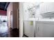 This laundry room is equipped with a washer and dryer and lots of storage at 5200 Peachtree Rd # 1104, Atlanta, GA 30341