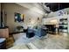 This spacious living room blends seamlessly with a modern kitchen, featuring an open-concept layout at 5200 Peachtree Rd # 1104, Atlanta, GA 30341