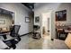 This office features an open layout with two seating areas, a printer, and shelving at 5200 Peachtree Rd # 1104, Atlanta, GA 30341
