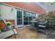 Outdoor patio area with table and chairs, offering a relaxing space for residents and visitors to enjoy the outdoors at 5200 Peachtree Rd # 1104, Atlanta, GA 30341