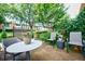 Comfortable seating in a beautifully landscaped patio area, perfect for relaxation and enjoying the outdoor atmosphere at 5200 Peachtree Rd # 1104, Atlanta, GA 30341