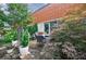 Private patio area with manicured landscaping and comfortable seating, ideal for enjoying outdoor living in a serene setting at 5200 Peachtree Rd # 1104, Atlanta, GA 30341