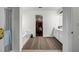 Well-lit bathroom with a soaking tub, shower, and access to a large walk-in closet at 15 Saddlebrook Ct, Covington, GA 30016