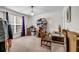 Bright bedroom featuring neutral walls, carpeted floors, lots of storage, and natural light at 15 Saddlebrook Ct, Covington, GA 30016
