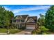 Charming two-story home with a brick facade and landscaped front yard at 15 Saddlebrook Ct, Covington, GA 30016