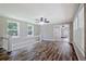 Upstairs living space featuring hardwood flooring and access to a dining area at 3440 Wilson Rd, South Fulton, GA 30349