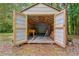 Spacious shed with wood frame construction for storage at 3440 Wilson Rd, South Fulton, GA 30349